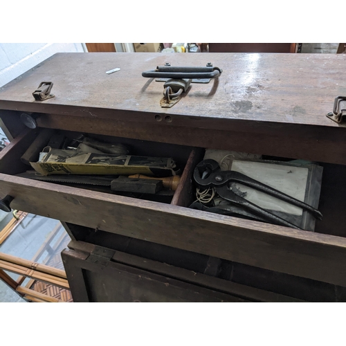 79 - A mixed lot of tools contained mainly in three wooden tool boxes to include a Mercer dial gauge, a M... 