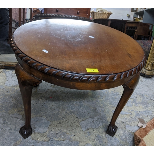 94 - Early 20th century walnut coffee table with circular top with moulded gadroon edge, on cabriole legs... 