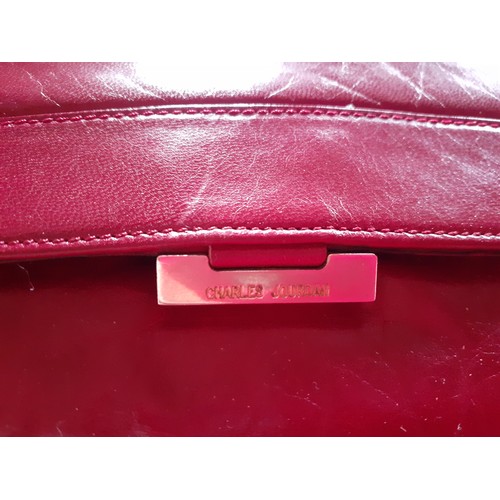 65 - A group of vintage bags and accessories to include a Charles Jourdan fuchsia pink leather clutch bag... 