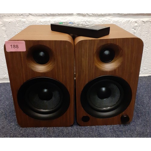 188 - A pair of Kanto walnut cased powered speakers with bluetooth and built-in phono pre-amp, 140W Class ... 