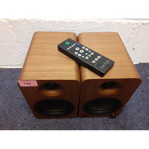 188 - A pair of Kanto walnut cased powered speakers with bluetooth and built-in phono pre-amp, 140W Class ... 