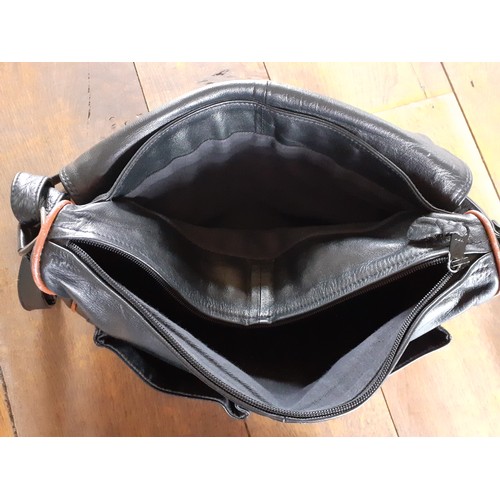 94 - Two vintage bags comprising a Suzy Smith black leather handbag 31cm Wide x 21cm High having a mock s... 