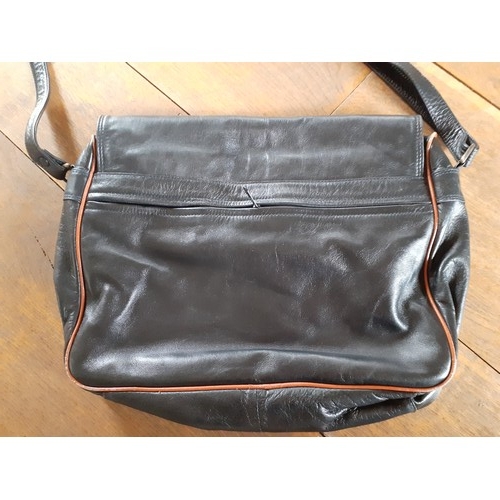 94 - Two vintage bags comprising a Suzy Smith black leather handbag 31cm Wide x 21cm High having a mock s... 