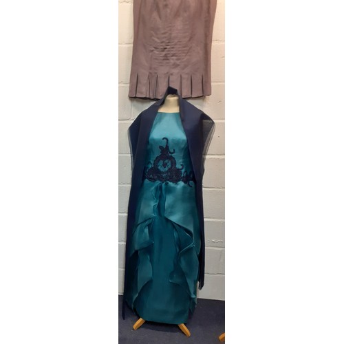 92 - A 2000's Wim Hemmink teal silk sleeveless evening gown, UK size 14, having navy lace applique to the... 