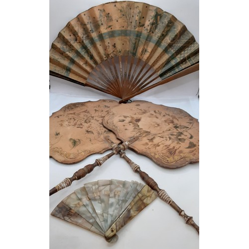 132 - A pair of late 19th Century treen face fans with painted images of wild flowers together with later ... 