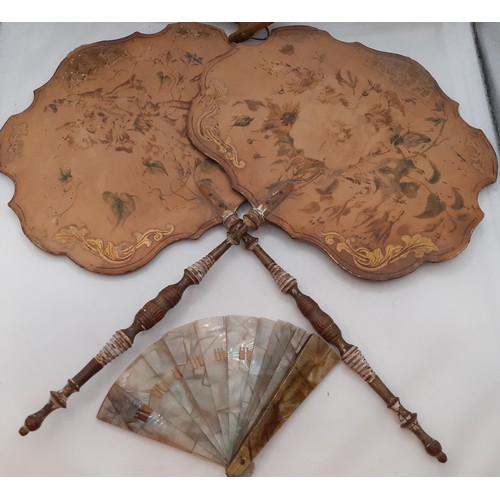 132 - A pair of late 19th Century treen face fans with painted images of wild flowers together with later ... 