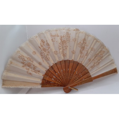 133 - Five early to mid 20th Century paper and fabric fans to include an Oriental black paper fan with pai... 