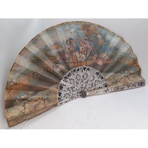 134 - Four fans comprising 19th Century bone wand and palmette style fan, a Victorian black fabric fan, a ... 