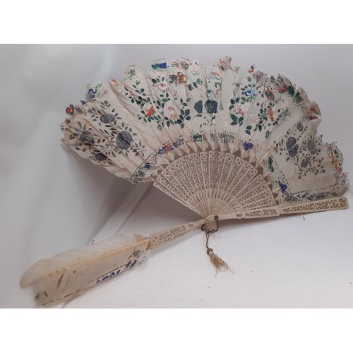 134 - Four fans comprising 19th Century bone wand and palmette style fan, a Victorian black fabric fan, a ... 