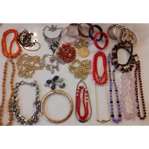 104 - A quantity of vintage costume jewellery, mainly bead necklaces to include a 3-strand Aurora Borealis... 