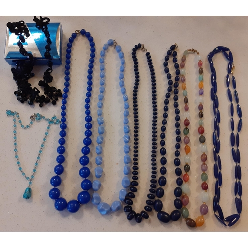 104 - A quantity of vintage costume jewellery, mainly bead necklaces to include a 3-strand Aurora Borealis... 