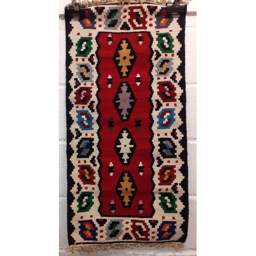 109 - A group of 5 small Kelim rugs in vibrant geometric patterns, various sizes two 19x38