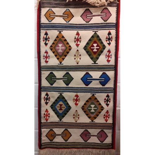 109 - A group of 5 small Kelim rugs in vibrant geometric patterns, various sizes two 19x38