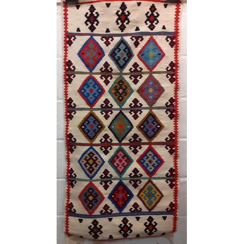 109 - A group of 5 small Kelim rugs in vibrant geometric patterns, various sizes two 19x38