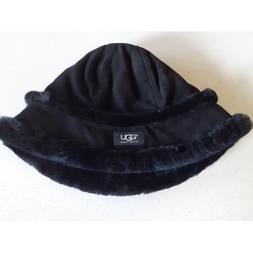 117 - Ugg- A black 'City' bucket hat with black shearling lining, size small/medium with branded box. 
Loc... 