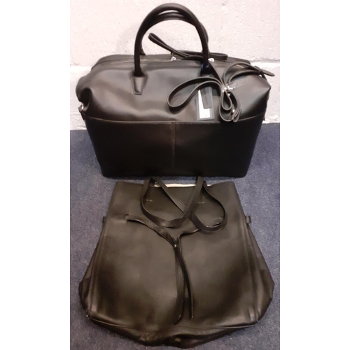 161 - Two black M&S leather bags to include a weekend/cabin bag, new with an original tags (rrp £129). 
Lo... 