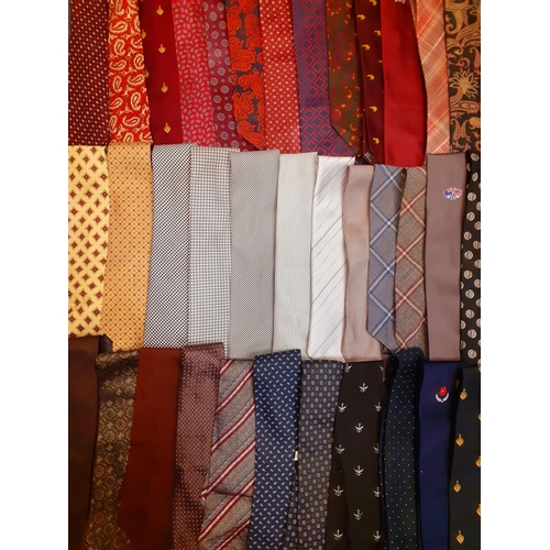 163 - A large quantity of vintage ties to include club ties, Tie Rack examples, Edinburgh Kilt Company, Ha... 