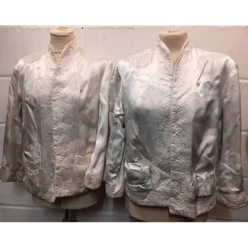 58 - Two Oriental silk reversible jackets A/F with machine embroidered designs 36