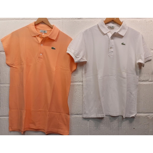 61 - Lacoste-Two ladies sports t-shirts in peach and white 38 and 40