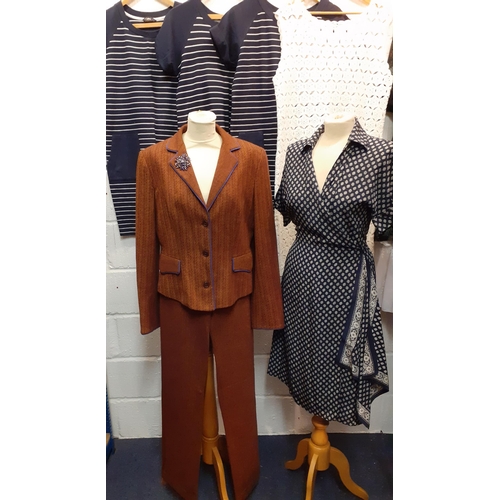 83 - A quantity of ladies clothing to include an Etro brown trouser suit with lilac trim and vintage lila... 