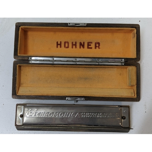 378 - A Hohner harmonica 64 Chromonica Octaves professional model, cased
Location: 7:2