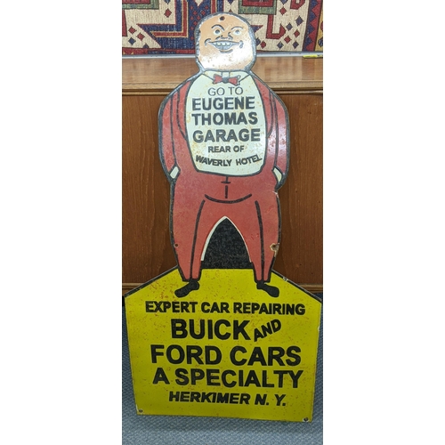 374 - A late 20th century 'Eugene Thomas Garage' enamel advertising sign, 91cm x 44cm
Location:A4F