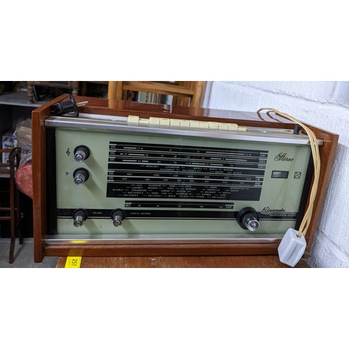 327 - A mid-century teak cased stereo record deck, and a Rigonda Marksman stereo audio radio
Location: G