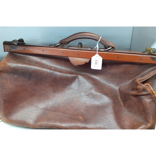 138 - Teo early 20th Century brown leather Gladstone bags with leather handles, metal hinges and locks, th... 