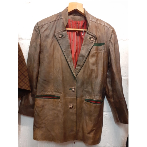 147 - A group of 3 gents vintage coats to include a gents black leather tail coat 40