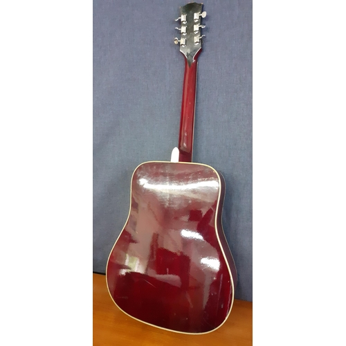 184 - A Columbus Hummingbird acoustic 6-string guitar model no:WH-59, having a cherry sunburst design, mot... 