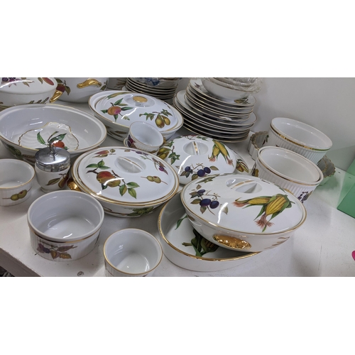 201 - A collection of Royal Worcester Evesham pattern dinnerware to include tureens, dinner plates and oth... 