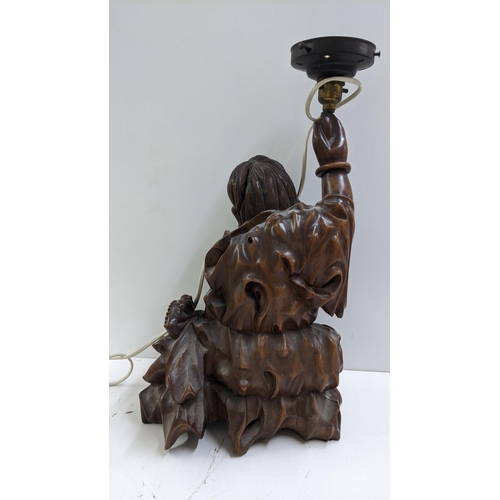 237 - A Chinese root carved figural table lamp of a seated man in a naturalistic setting, 44cm h Location:... 