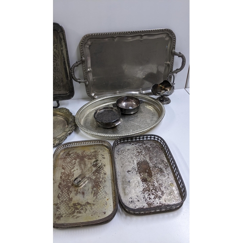 243 - Mixed silver plate to include condiments, twin handled trays and other items Location: 11-2