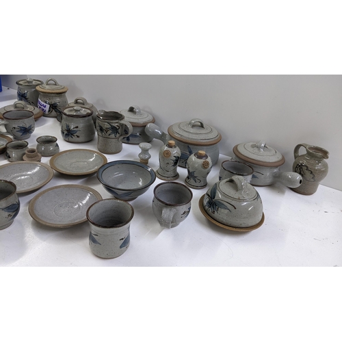 256 - A collection of Cornish Truro pottery to include cups, jugs, jars and other items Location: A4M