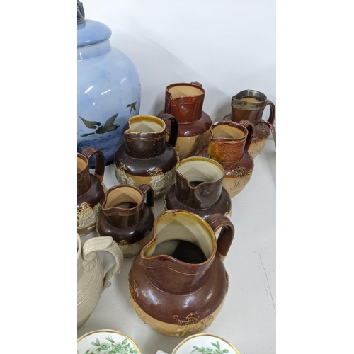 318 - Mixed ceramics to include eight Doulton Lambeth two tone salt glazed jugs, together with a 19th cent... 