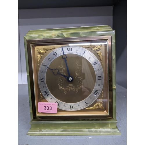 333 - An Elliot onyx cased mantle clock, retailed by Jamieson and Carry with presentation plaque to top of... 