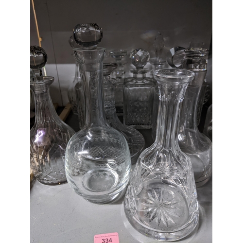 334 - A selection of cut glass decanters to include one by Atlantis and a Stuart crystal presentation pede... 