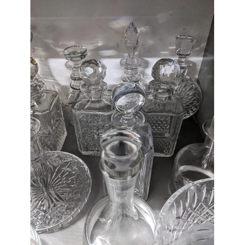 334 - A selection of cut glass decanters to include one by Atlantis and a Stuart crystal presentation pede... 