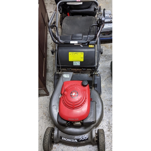 339 - A Honda HRD 536 petrol lawn mower with grass box
Location: G