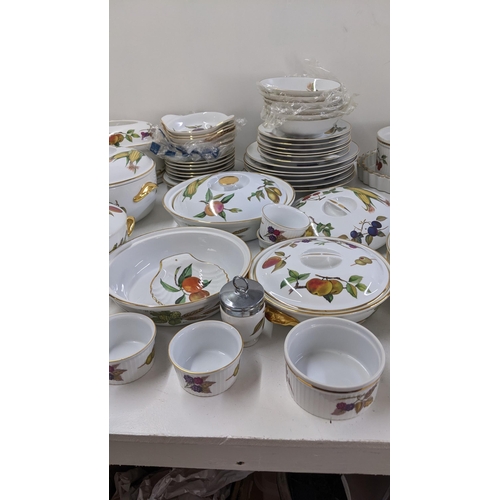 201 - A collection of Royal Worcester Evesham pattern dinnerware to include tureens, dinner plates and oth... 