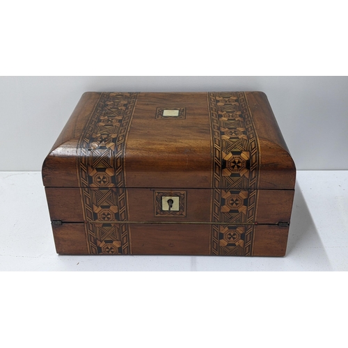 203 - A Victorian walnut Tunbridge ware writing slope with parquetry inlaid and fitted interior
Location: ... 