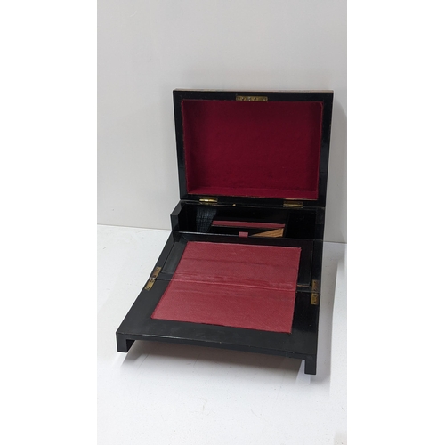 203 - A Victorian walnut Tunbridge ware writing slope with parquetry inlaid and fitted interior
Location: ... 