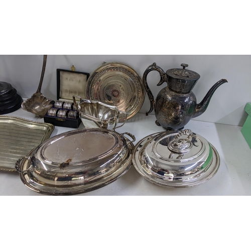 204 - Mixed silver plate to include lidded tureens, trophy boxed napkin rings, teapot and other items
Loca... 