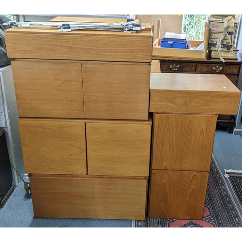 235 - A mid 20th century Tapley teak Ladderax style wall unit
Location: LAF