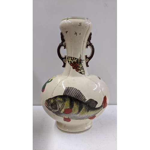 258 - A Victorian William Stephen Coleman for Minton twin handled vase, decorated with fish and insects A/... 