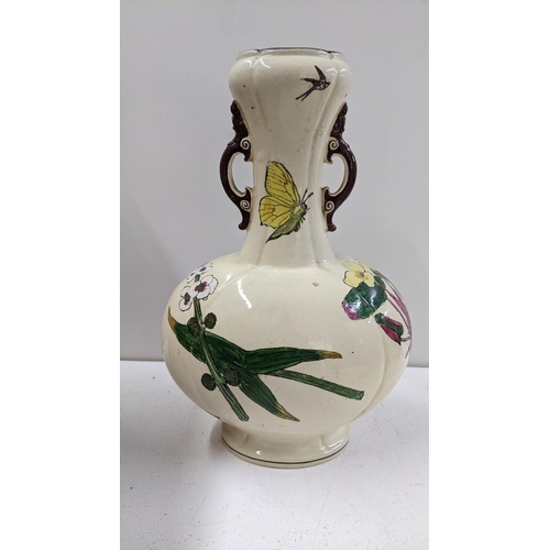 258 - A Victorian William Stephen Coleman for Minton twin handled vase, decorated with fish and insects A/... 