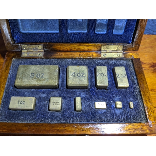 268 - A set of Post Office scales with a cased set of weights
Location: 3-3