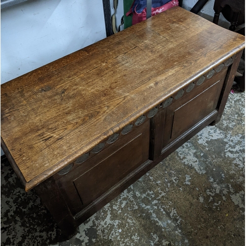 299 - An 18th century oak chest with a later top Location: G