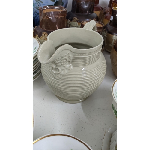 318 - Mixed ceramics to include eight Doulton Lambeth two tone salt glazed jugs, together with a 19th cent... 