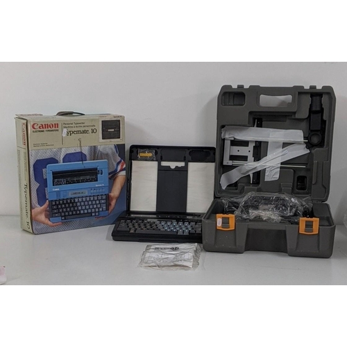 319 - An unopened RYO6I II50 V plunge Router with its box together with a Cannon typemate 10 electronic ty... 